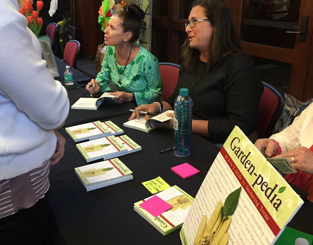 Maria and Pam signing copies of Garden-pedia